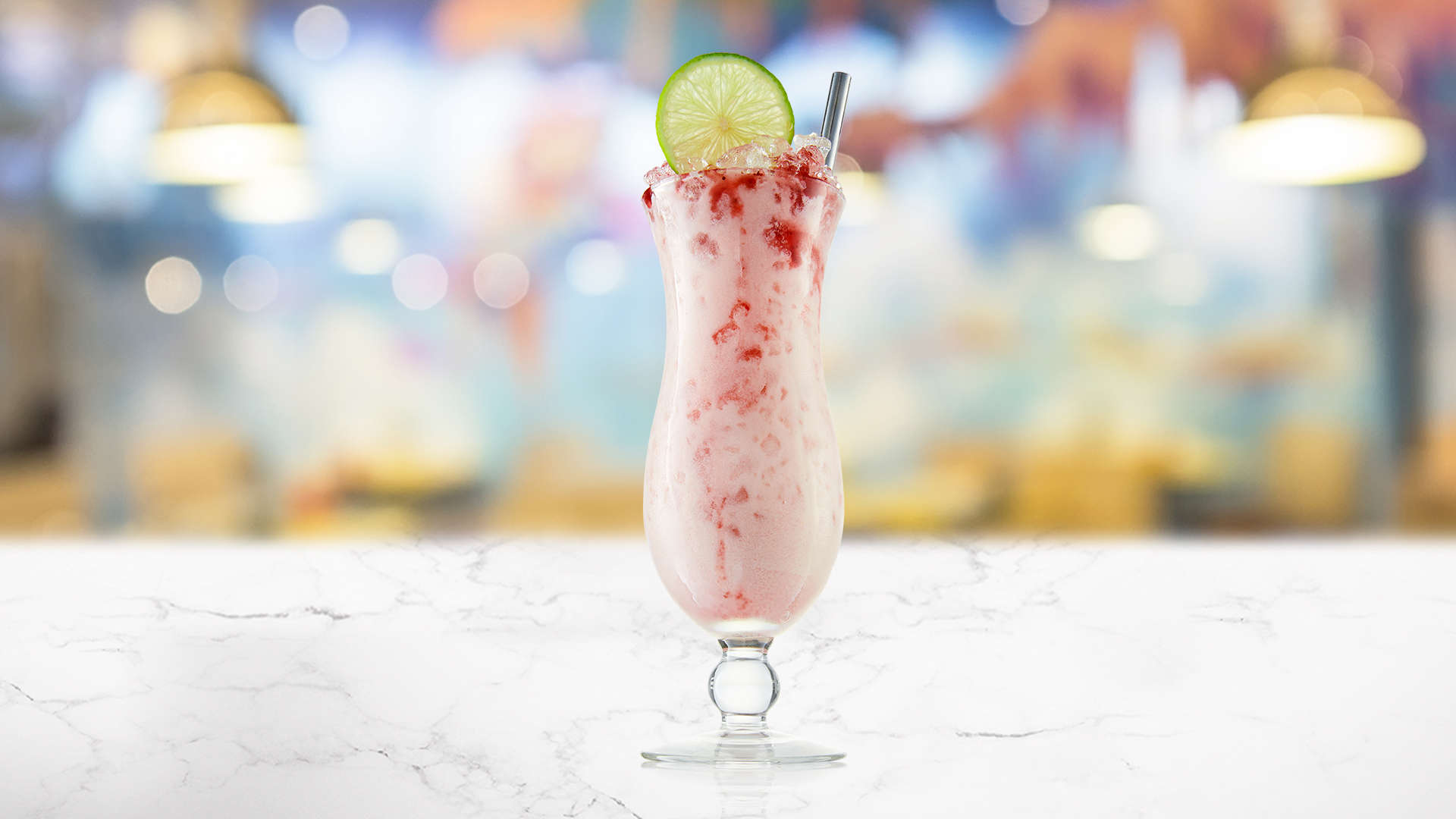 Hibiscus Colada cocktail on a marble surface