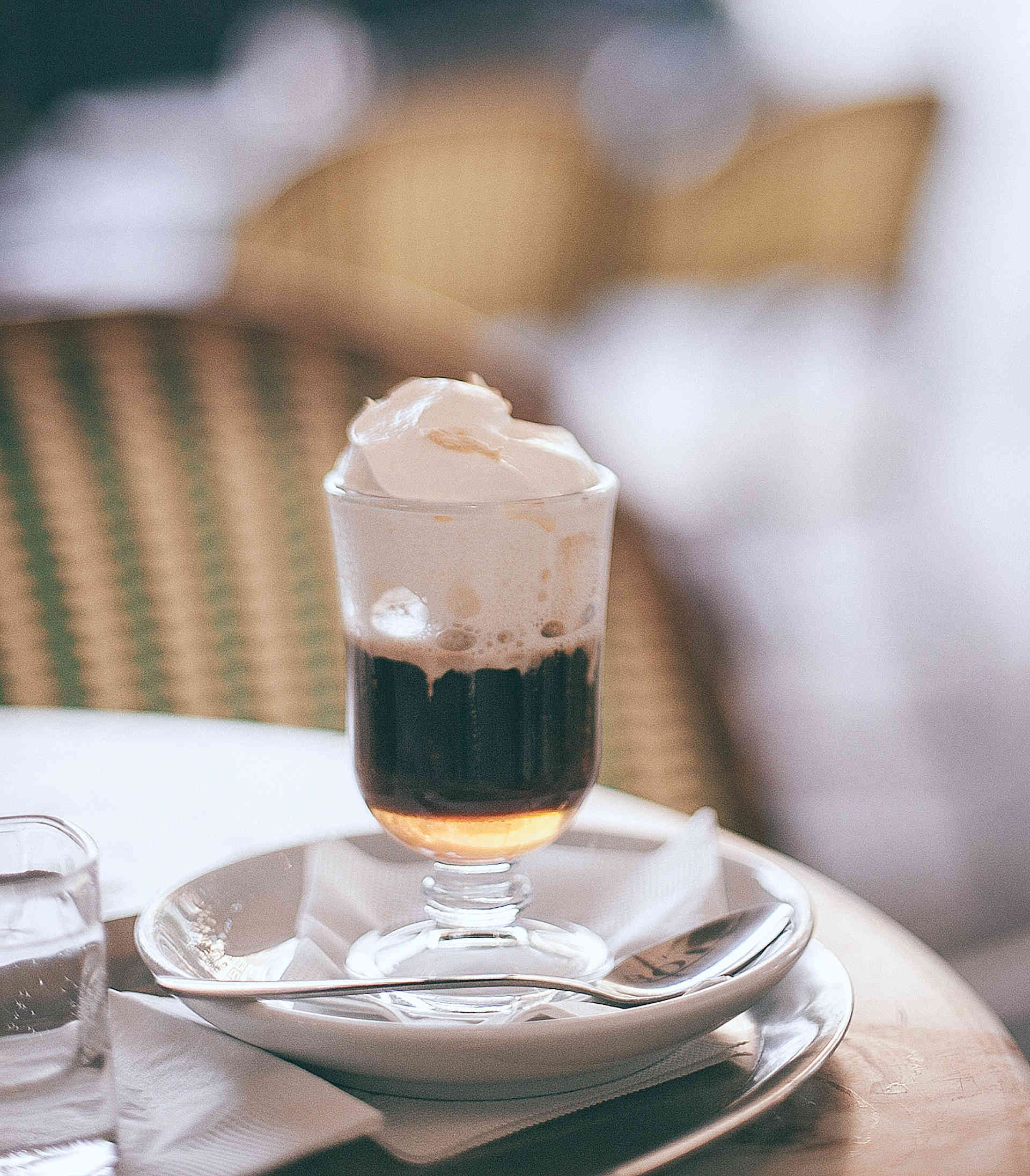 A glass filled with Irish Cream Chocolate Coffee and ice