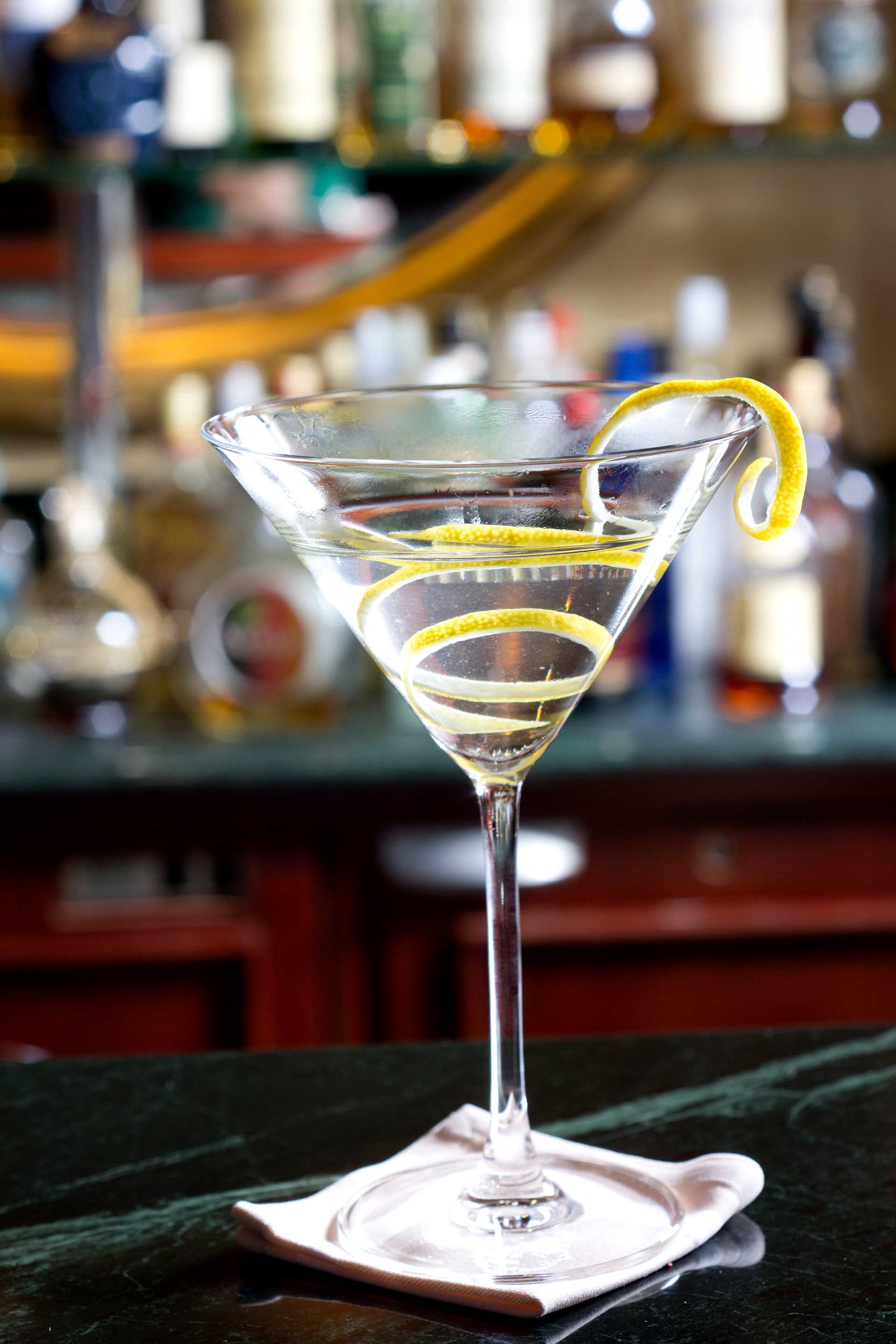 A lemon martini cocktail on a bar