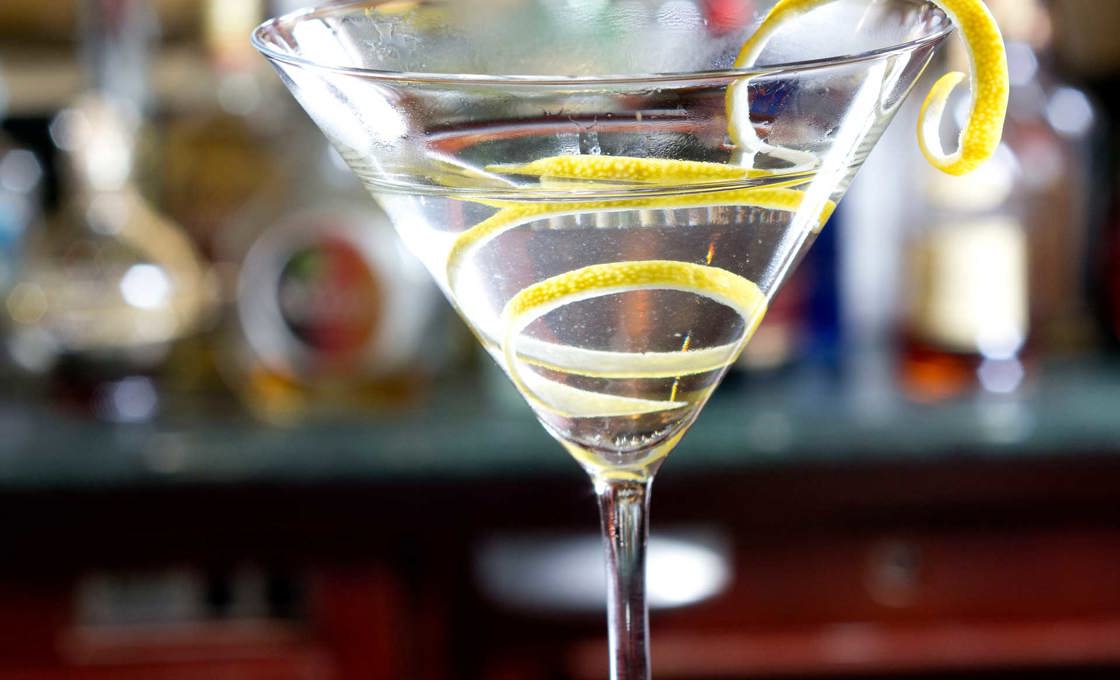 A lemon martini cocktail on a bar