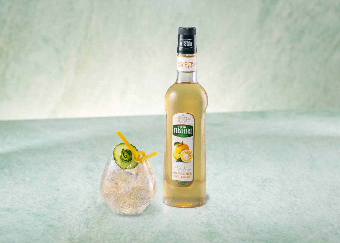 Yuzu & Cucumber Soda with a bottle of Mathieu Teisseire Yuzu lemon syrup