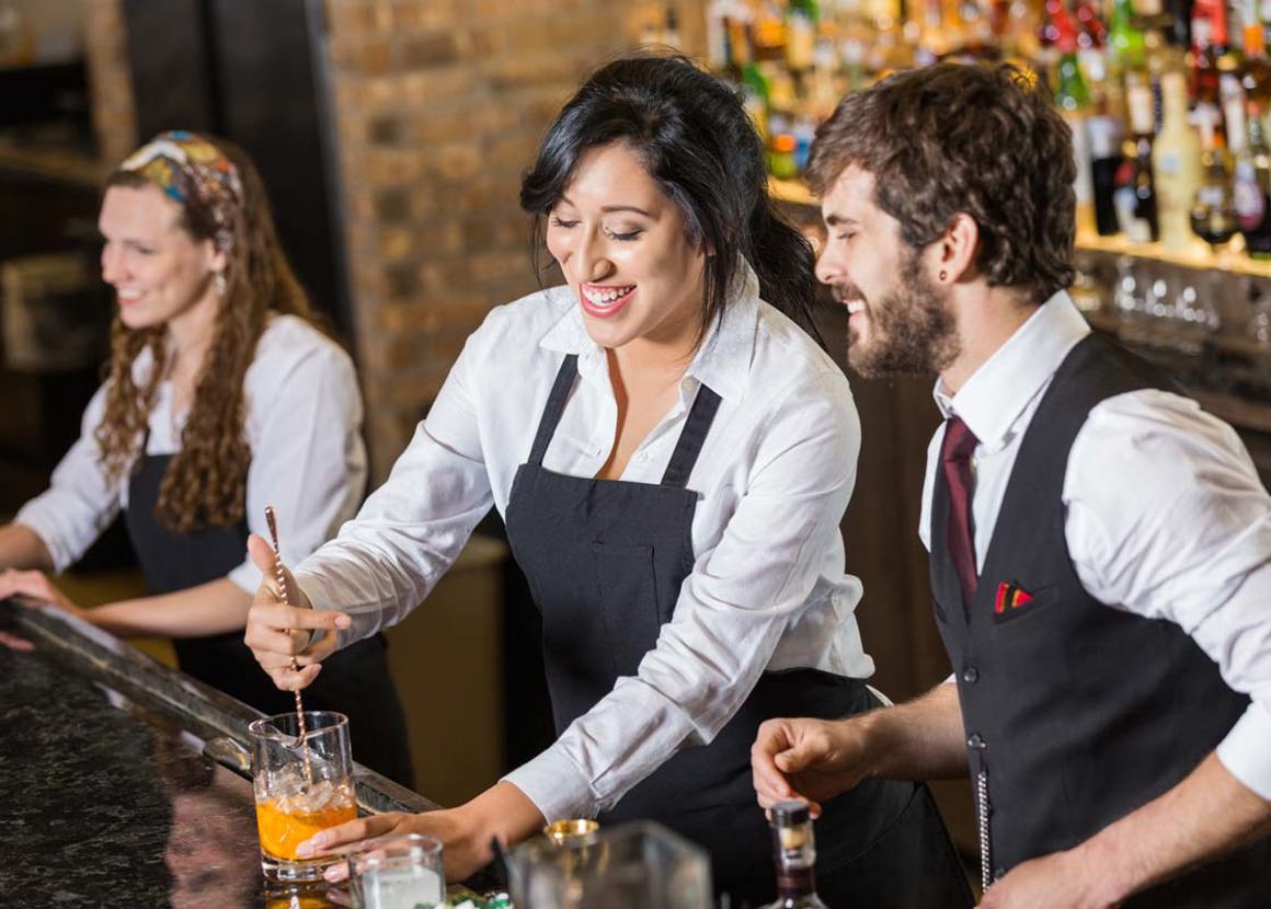 bar staff making a cocktail