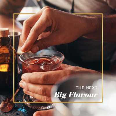 The next big flavour - hands holding a cocktail