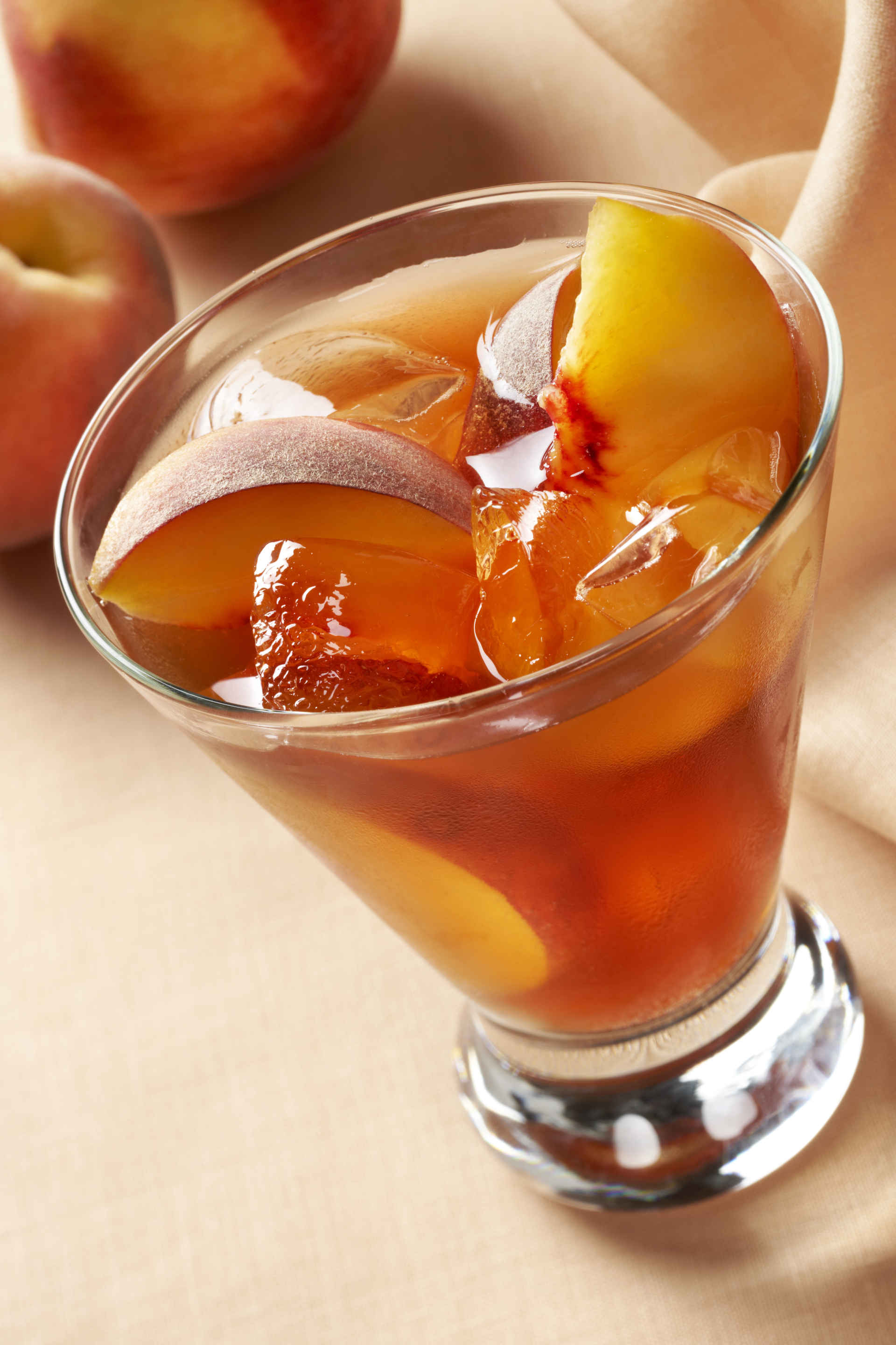 Close up of a glass of Peach Iced Tea