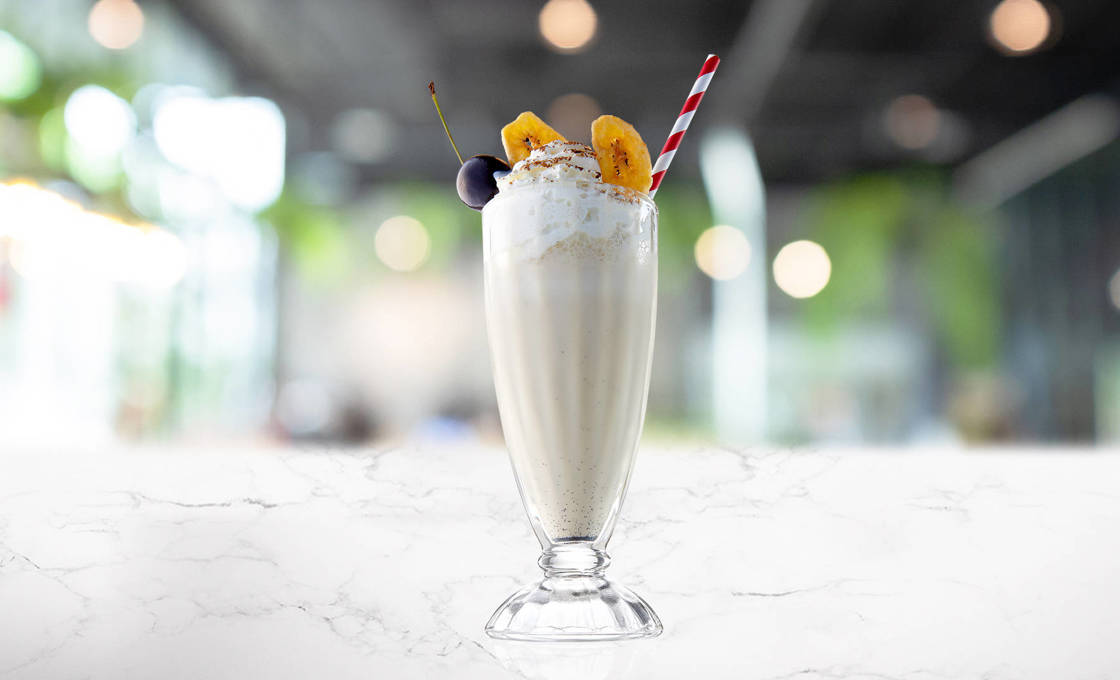 Class of Okinawa Cheese Frappe on a marble surface