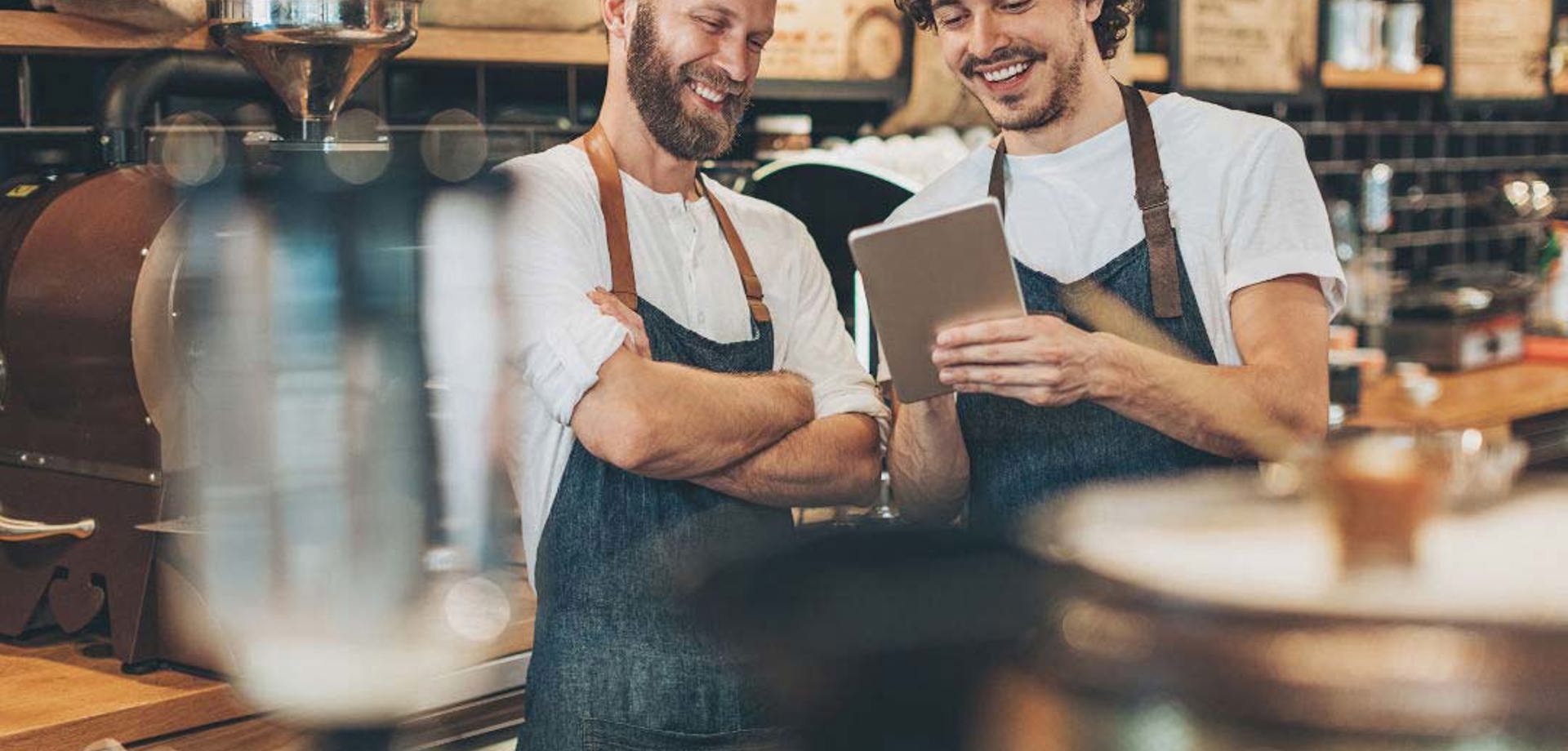 Two bartenders smiling