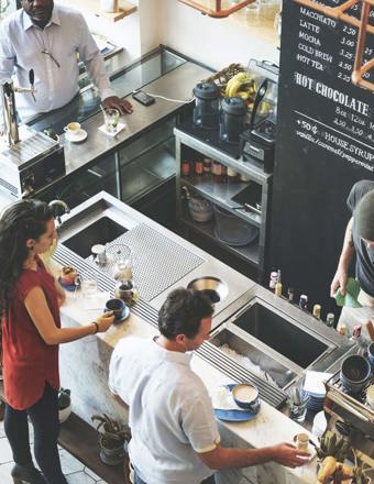 top view of coffee shop counter with customers