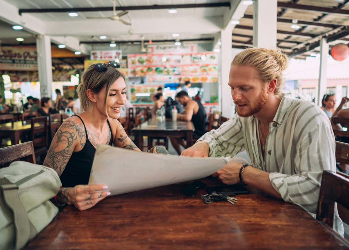 two people looking at sheet