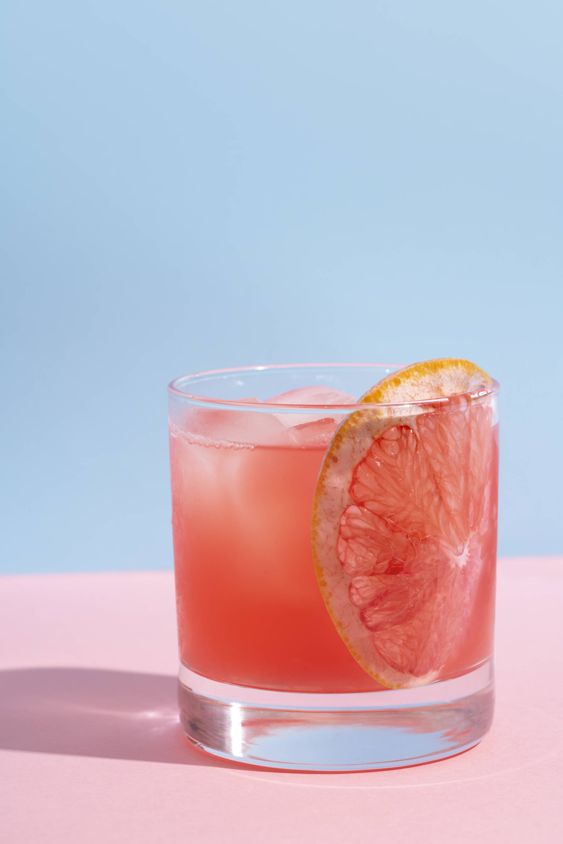 Florida Fizz on pink table and blue wall