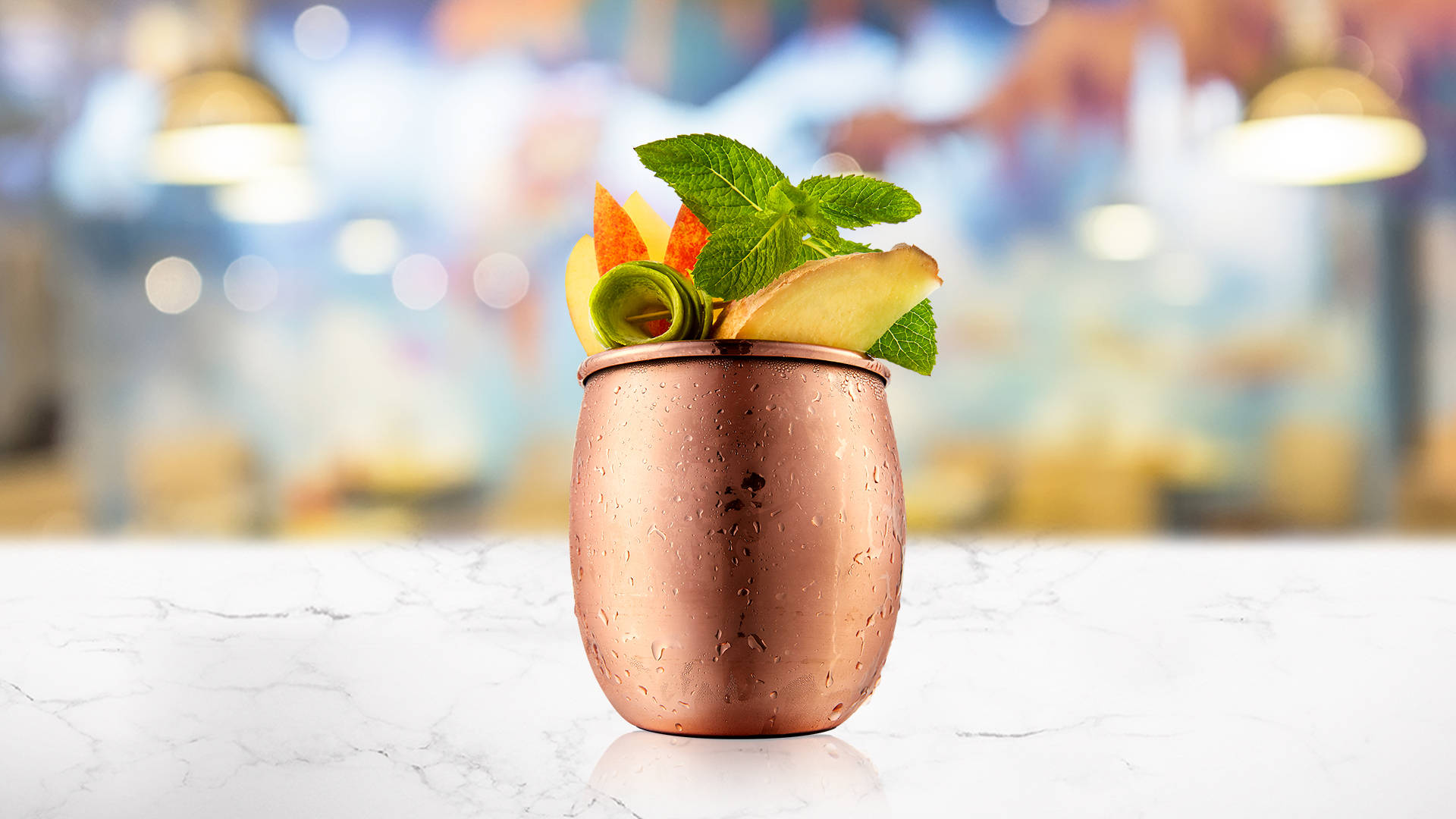 Green Tea & Apple Mule in a copper mug